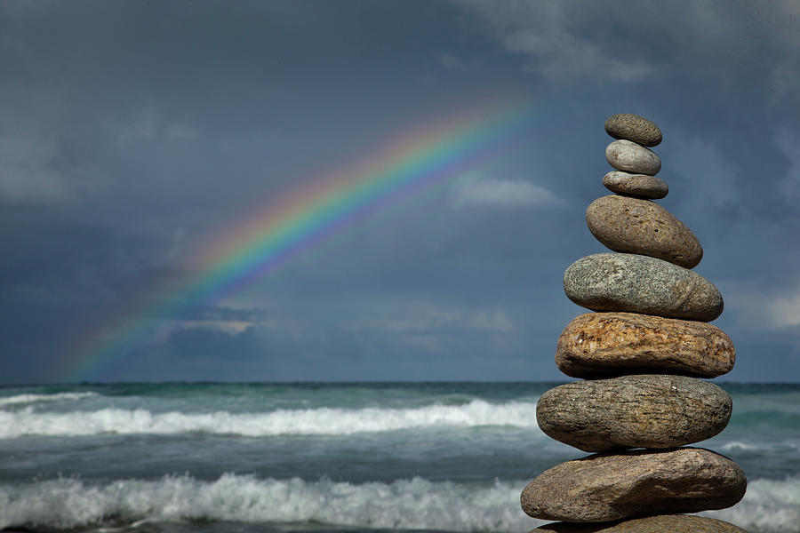 Rainbow And Balanced Stones At Seaside Photograph by John White Photos