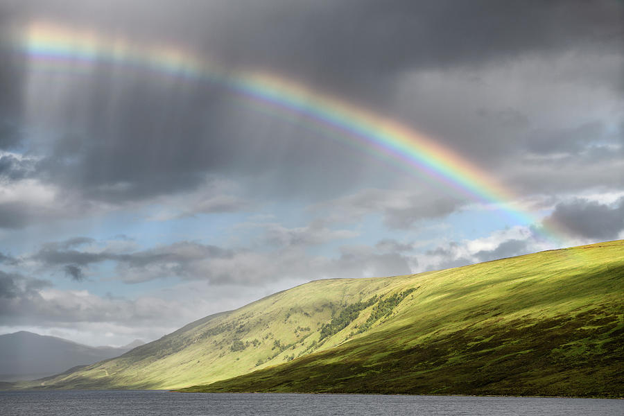 Rainbow and dark clouds over Loch a Chroisg ending at An Liathan ...