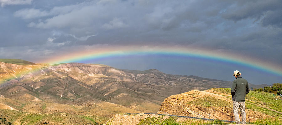 Rainbow in the Judean Desert Photograph by Roberta Kayne