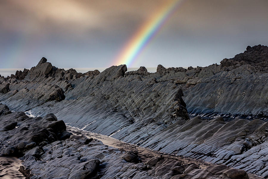 Rainbow on the Rocks Photograph by Framing Places