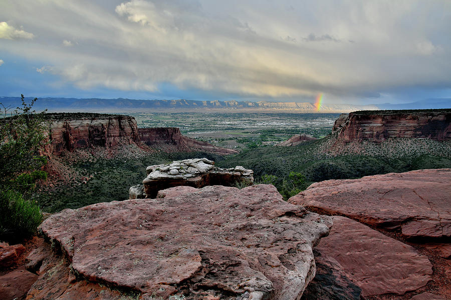 Rainbow over Book Cliffs from Grand View Point Photograph by Ray Mathis