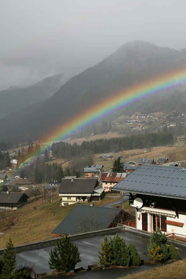 Rainbow Over  Chalet Of Alpine Village Photograph