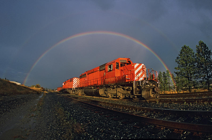 Rainbow Over Locomotives Photograph by Mike Danneman