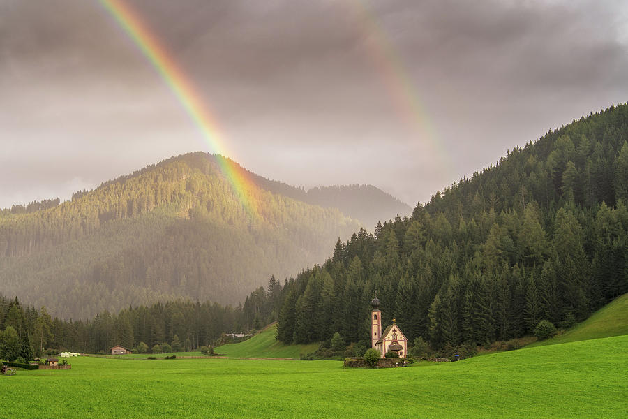 Rainbow over St  Johann Photograph by James Billings