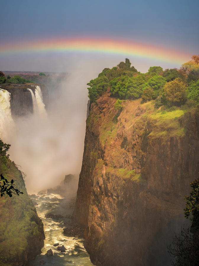 Rainbow over the Rift at Victoria Falls Photograph by Betty Eich