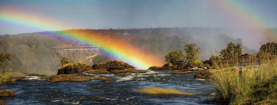Rainbow over the Zambezi river Photograph by Robert Grac