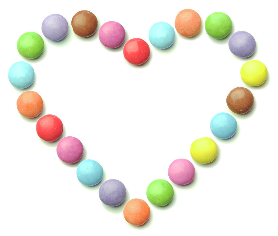 Still Life Photograph - Rainbow Sweets In Heart Shape by Tom Quartermaine