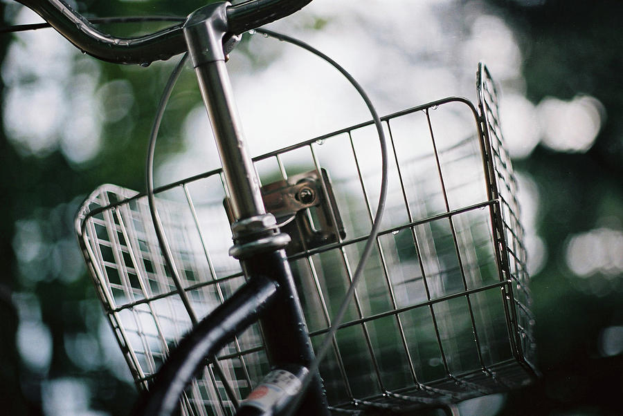 Raindrops Lingering On A Bike Basket Photograph by Breeze.kaze
