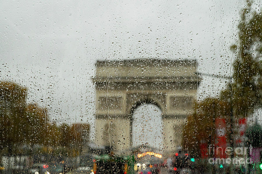 Rainy day at the Arc de Triomphe Paris France Photograph by Wayne Moran