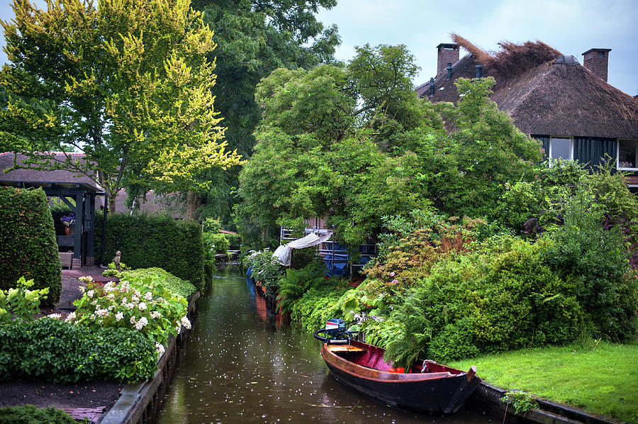 Rainy Day in Giethoorn. The Netherlands 1 Photograph by Jenny Rainbow