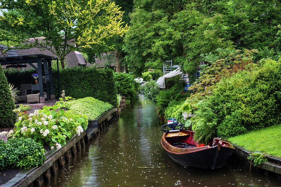 Rainy Day in Giethoorn. The Netherlands Photograph by Jenny Rainbow