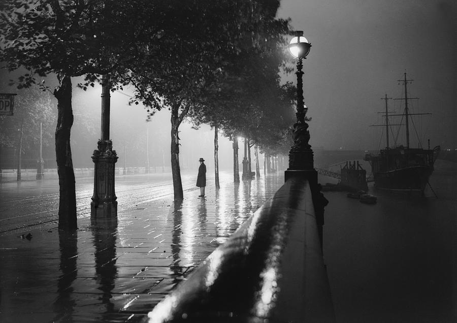 Rainy Embankment Photograph by Fox Photos