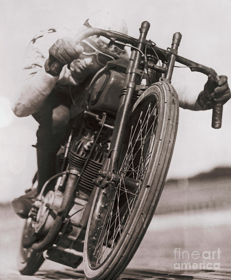 Ralph Hepburn Riding Motorcycle Photograph by Bettmann