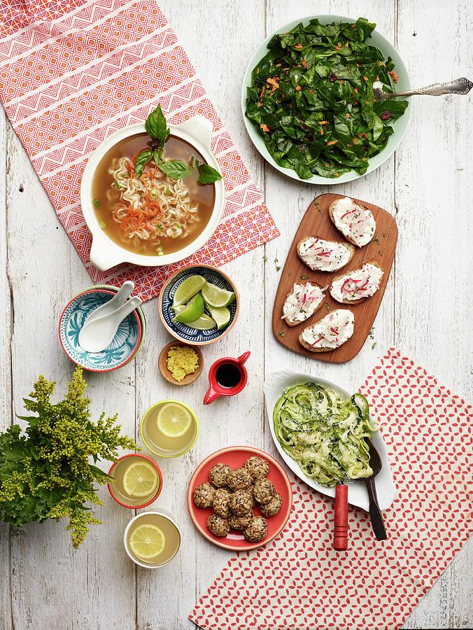 Ramen Soup, Kale, Sour Cream And Radish Spread, Courgette Salad, Grain Balls, And Herb Lemonade Photograph by Rene Comet