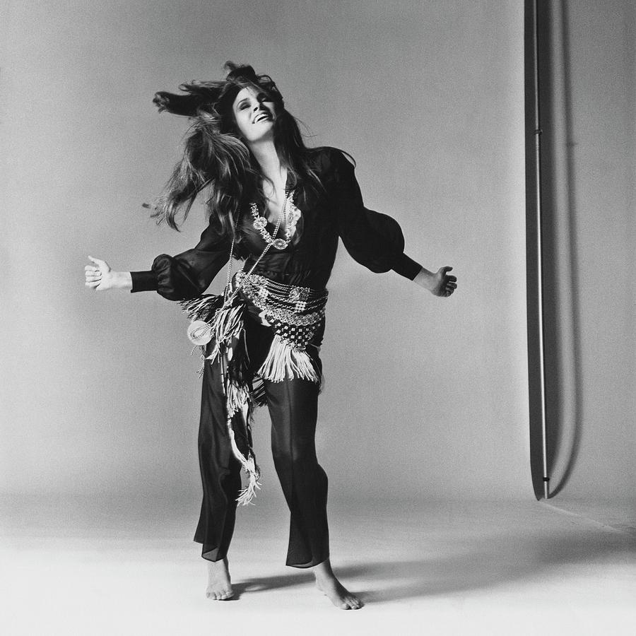 Raquel Welch Dancing Photograph by Bert Stern