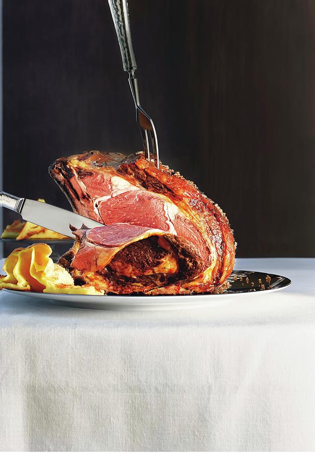 Rare Roast Beef Being Sliced Photograph by Jalag / Jan C. Brettschneider