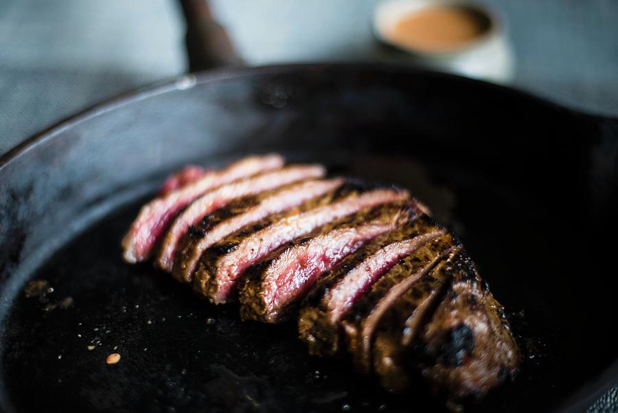 Rare Rumpsteak Marinated With Chilli And Cumin In A Pan Photograph by Jonathan Syer
