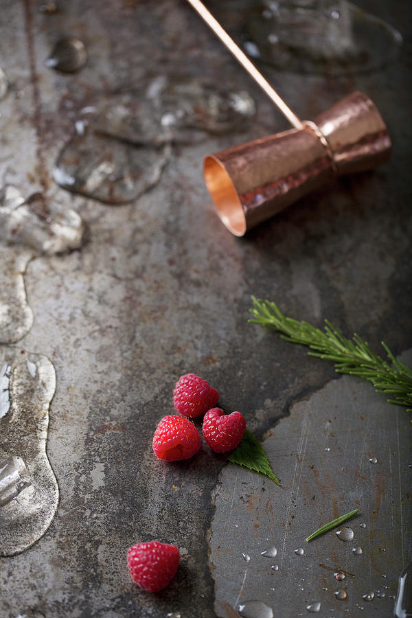 Rasberries And Shot Measure Photograph by Amelia Johnson