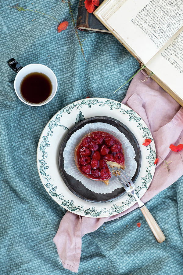 Raspberries Cake With A Cupo Of Tea And A Book Photograph by Lucie Beck