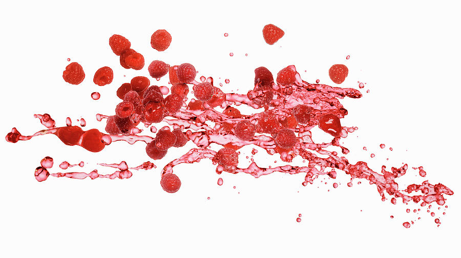 Raspberries With A Juice Splash Photograph by Krger & Gross