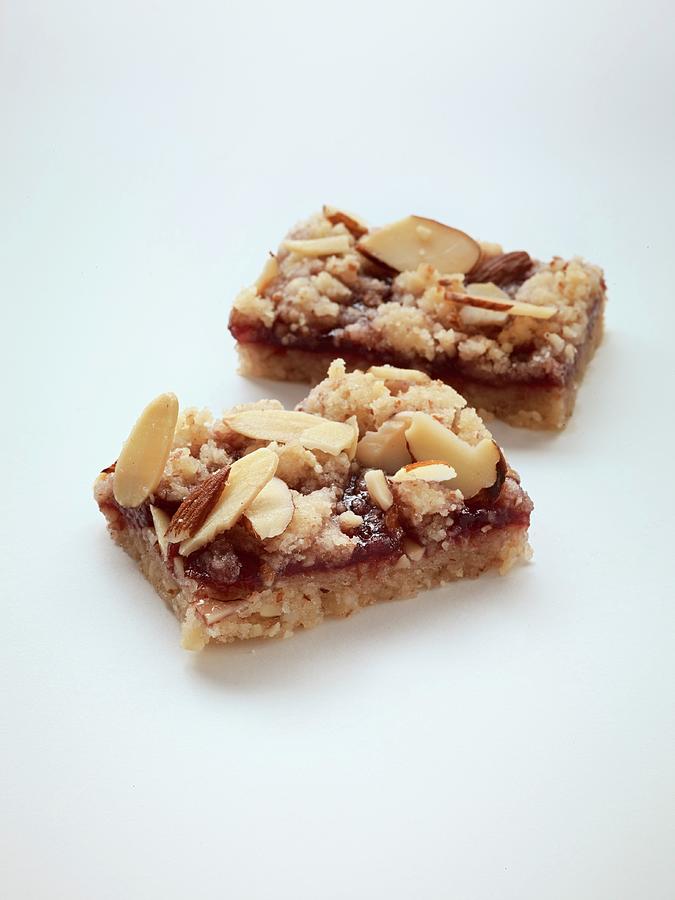 Raspberry And Almond Bars Photograph by Antonis Achilleos