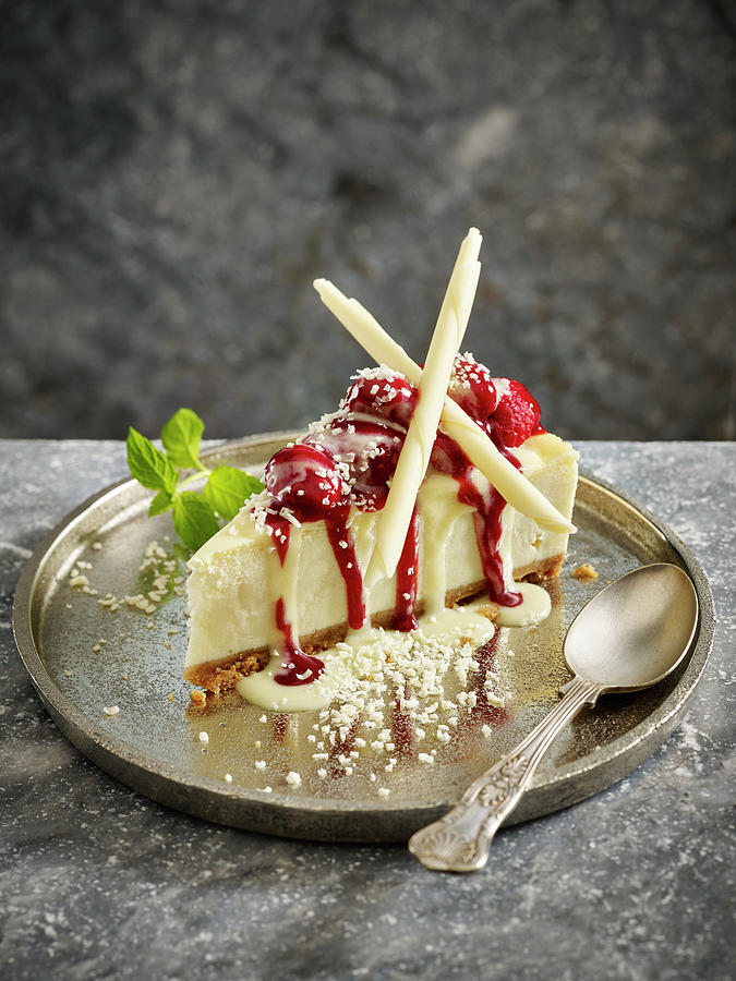 Raspberry And White Chocolate Cheesecake Photograph by Mark Wood