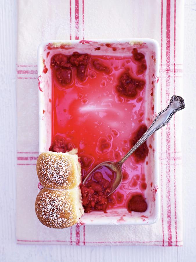 Raspberry Buchteln In A Baking Dish, Almost Eaten top View Photograph by Oliver Brachat