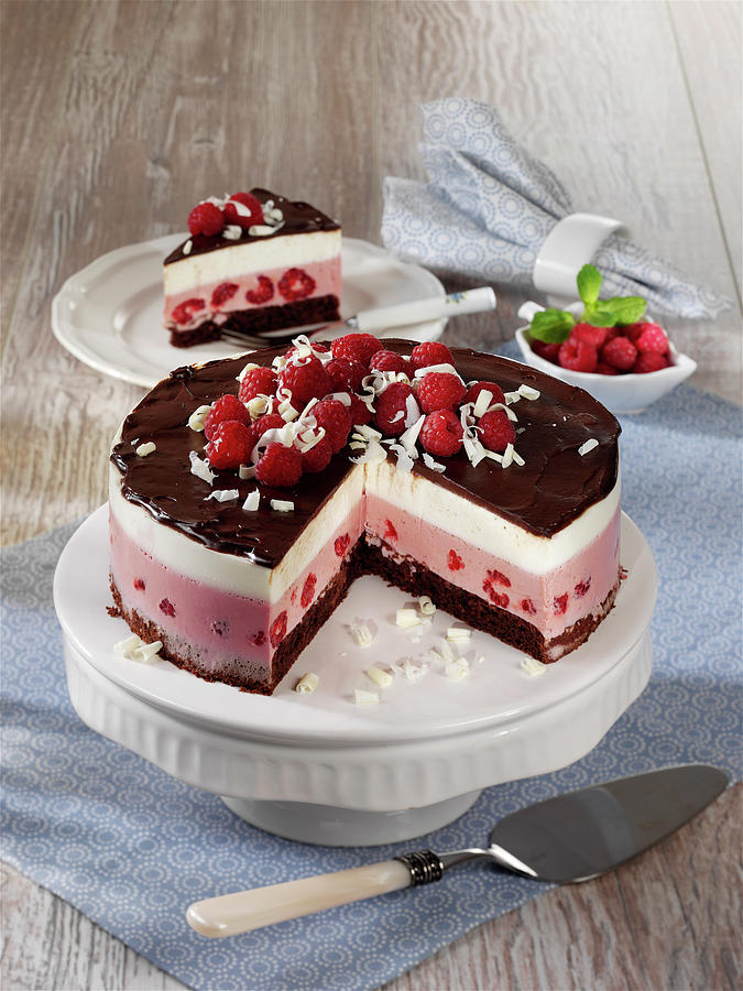 Raspberry Cream Cheesecake With Chocolate Photograph by Stockfood Studios / Photoart