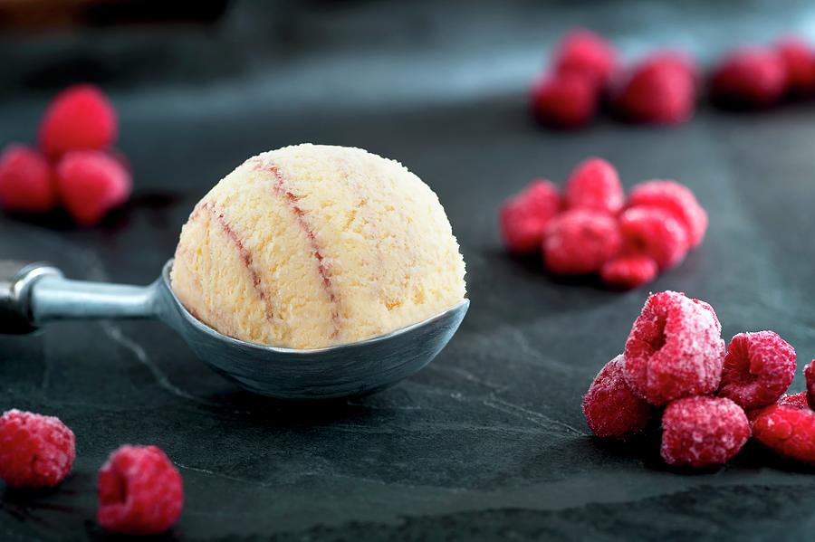 Raspberry Ice Cream And Frozen Raspberries Photograph by Howarth, Craig