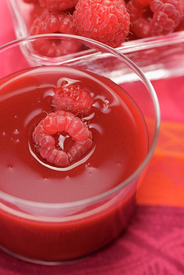 Raspberry Juice With Fresh Raspberries Photograph by Alain Caste