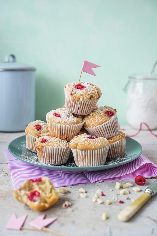 Raspberry Muffins With White Chocolate On A Plate Photograph by Magdalena Hendey
