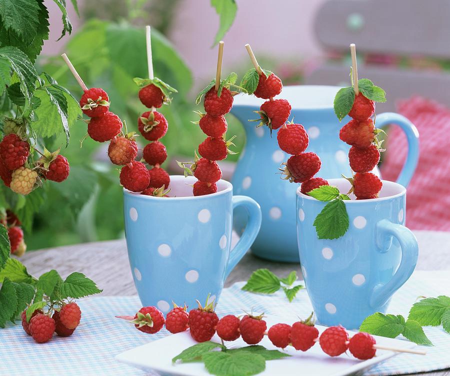 Raspberry Skewers In Cups Photograph by Strauss, Friedrich
