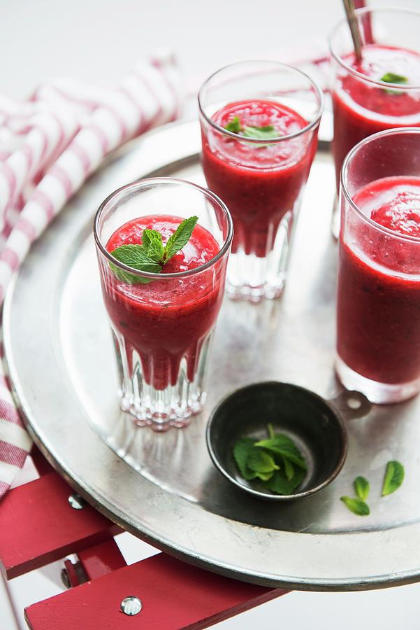 Raspberry Smoothie With Mint Leaves Photograph by Studer, Veronika
