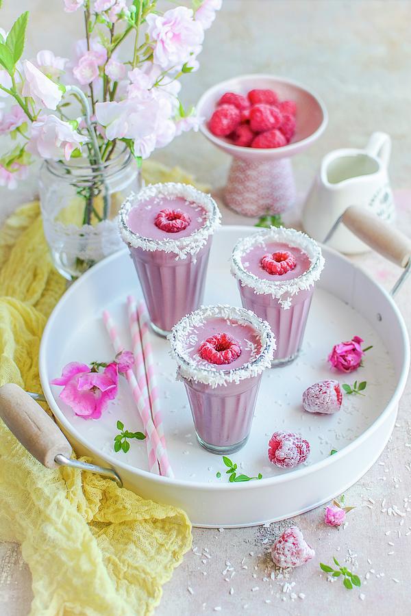 Raspberry Smoothies With Coconut Flakes Photograph by Olimpia Davies
