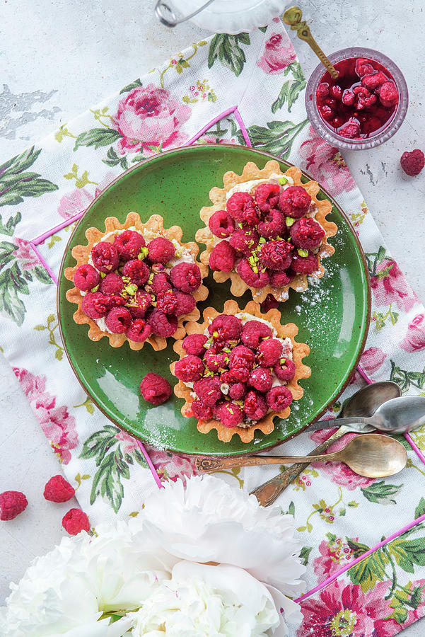 Raspberry Tarts With Pistachios From Above Photograph by Irina Meliukh