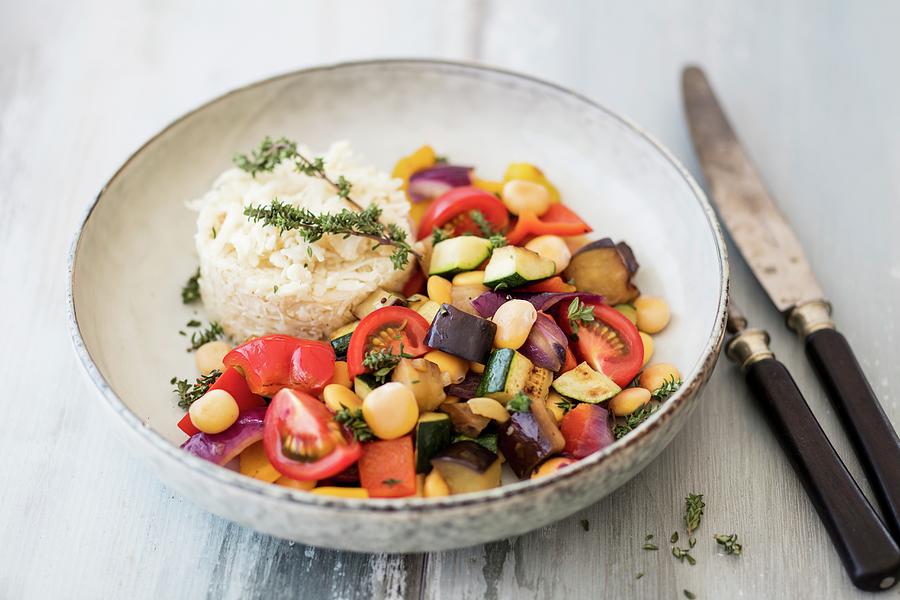 Ratatouille With Lupines, Thyme And Cauliflower Rice Photograph by Jan Wischnewski