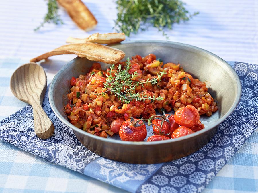 Ratatouille With Oven-baked Tomatoes And Thyme Photograph by Volker Dautzenberg