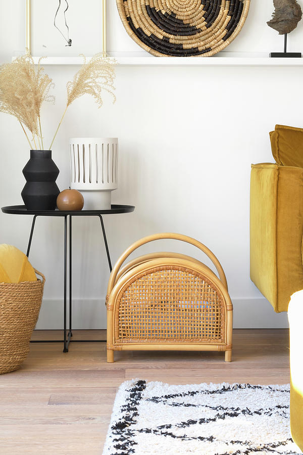 Rattan Magazine Rack In Living Room With Yellow Accents Photograph by Marij Hessel