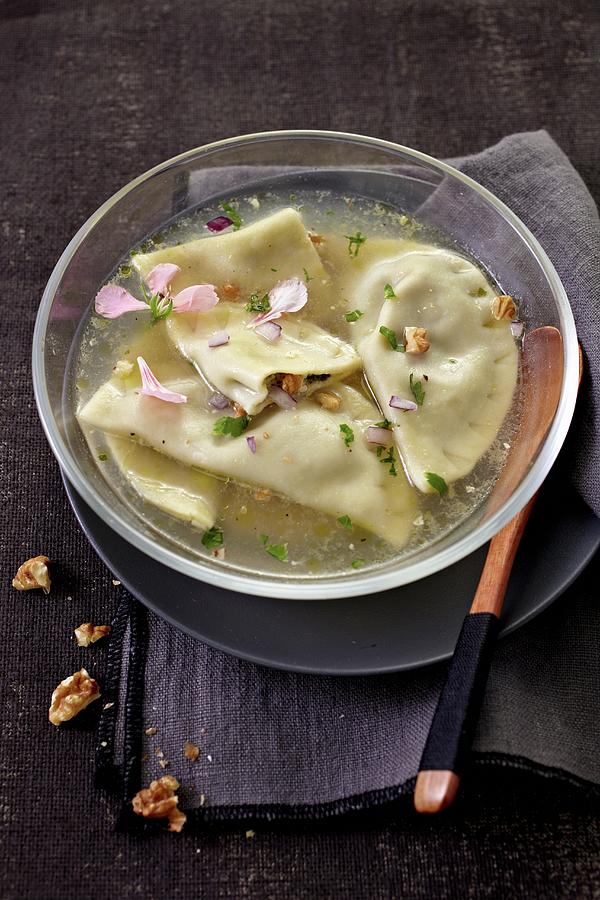 Ravioli Filled With Roquefort Cheese And Walnuts In Stock Photograph by Alessandra Pizzi