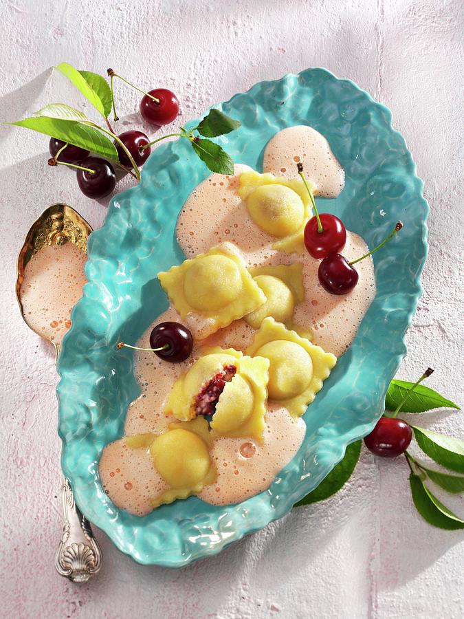 Ravioli With Cherry Filling And Zabaglione Photograph by Newedel, Karl