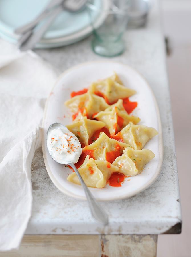 Raviolis à La Viande Sauce Paprika Et Yaourt Photograph by