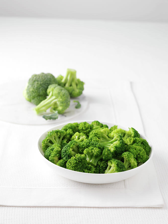 Still Life Digital Art - Raw Broccoli On Marble Cutting Board And Bowl Of Boiled Broccoli by Diana Miller
