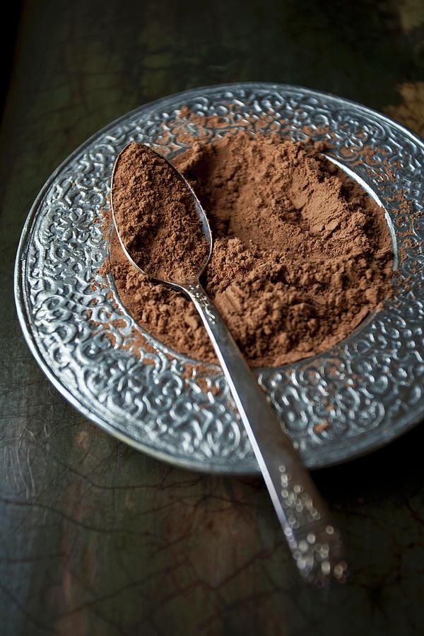 Raw Cacao Powder In A Silver Dish With A Spoon Photograph by Ryla Campbell