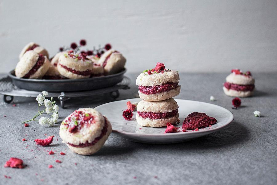 Raw Coconut Macarons With Strawberry Filling Photograph by Freiknuspern