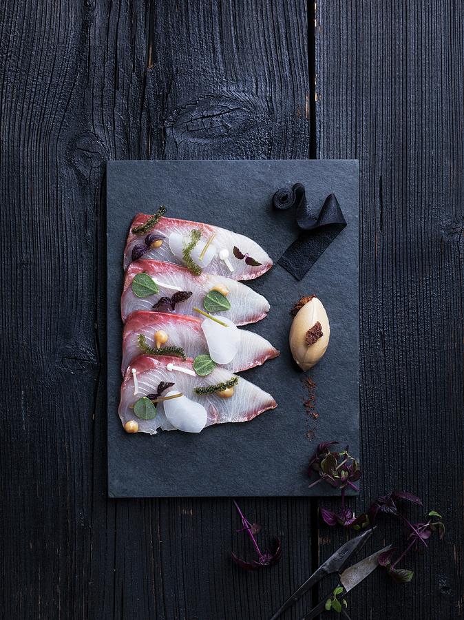 Raw Hamachi On A Fish Platter Photograph by Armin Zogbaum