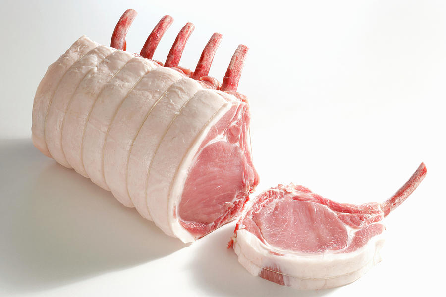 Raw Pork Chops, With A Cutlet Sliced Off Photograph by Teubner Foodfoto