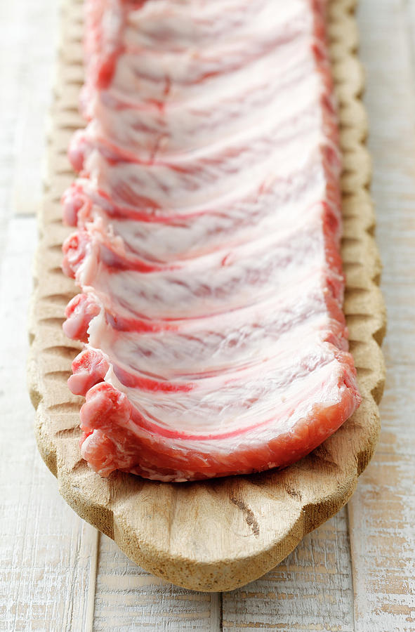 Raw Pork Ribs In A Wooden Dish Photograph by Petr Gross