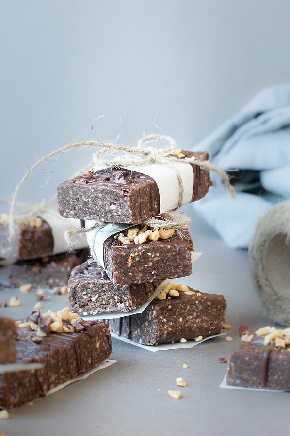 Raw Protein Bars With Chocolate And Hazelnuts Photograph by Healthylauracom