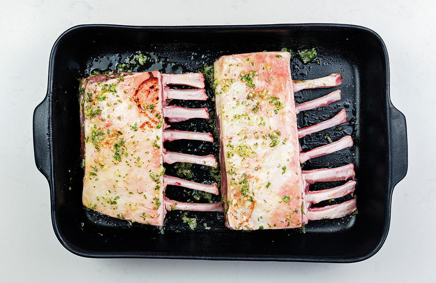 Raw Rack Of Lamb In A Roasting Tray Photograph by Lucy Parissi