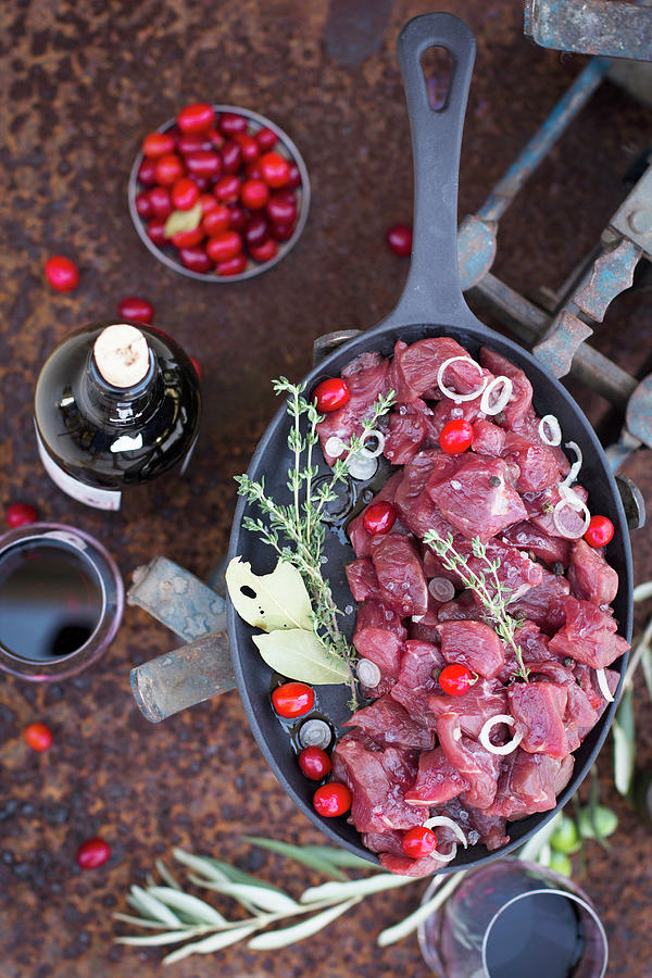 Raw Red Meat, Marinated With Wine, Berries And Spices Photograph by Lana Konat